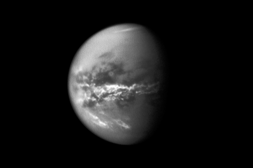 This is an image of Titan’s surface and clouds glimpsed through the haze.