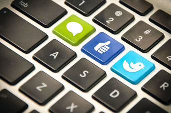 Social media buttons on a keyboard