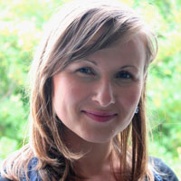 Photograph of a smiling 31-year-old Polish woman