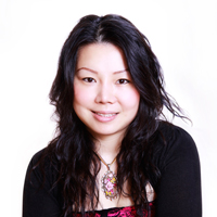 Photograph of smiling 36-year-old Chinese woman