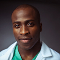 Photograph of smiling 44-year-old black African man