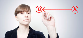 Woman drawing an arrow between points A and B
