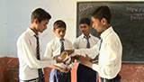 Students participating in role play activity