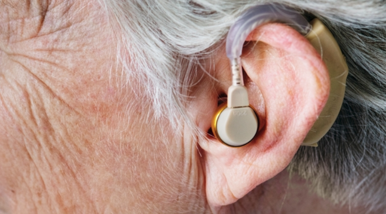 Elder With Hearing Aid