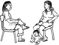 A Health Extension Practitioner talking to a client.