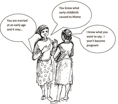 Health worker talking with a young married woman