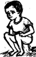 A child sitting on a potty.