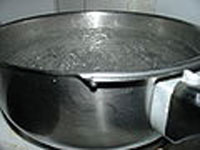 A pan of boiling water.