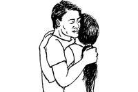 A man and woman hugging.