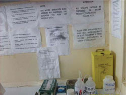 Injection area with safe injection procedures posted on the wall.
