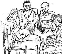 A group of people are seated around in a circle.