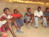 A group of men attend a focus group meeting.