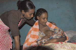 Health Extension Practitioner counselling a mother on exclusive breastfeeding