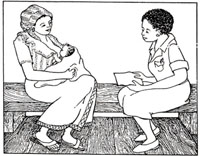 A health worker counselling a mother