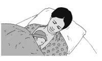 A mother sleeping with her baby lying asleep on her chest.