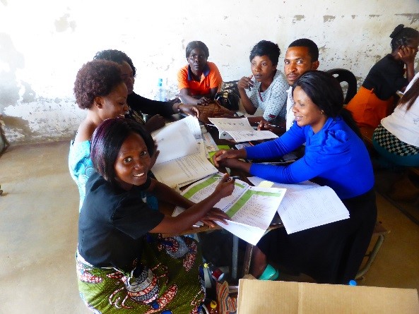 Teachers working together in a ‘Teacher Group Meeting’ in Zambia