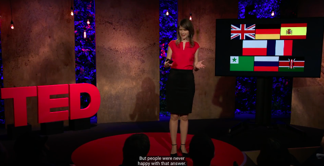 Screenshot of a lady talking at her Ted Talk titled: The secrets of learning a new language