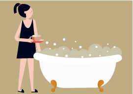 Woman holding cup of tea next to a bath