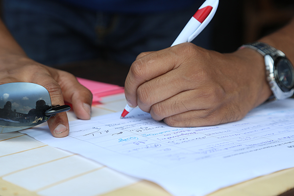 A person signing a consent form