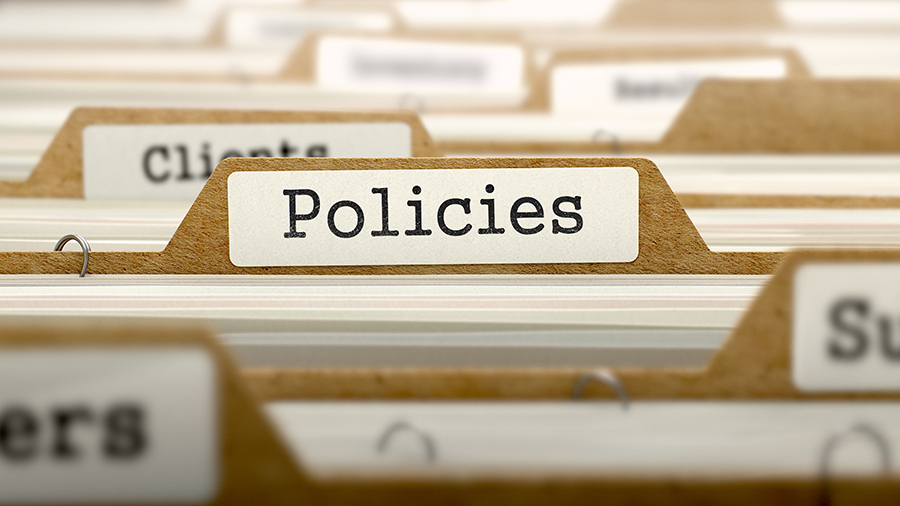 An image of file separators with the focus on one labelled ‘Policies’.