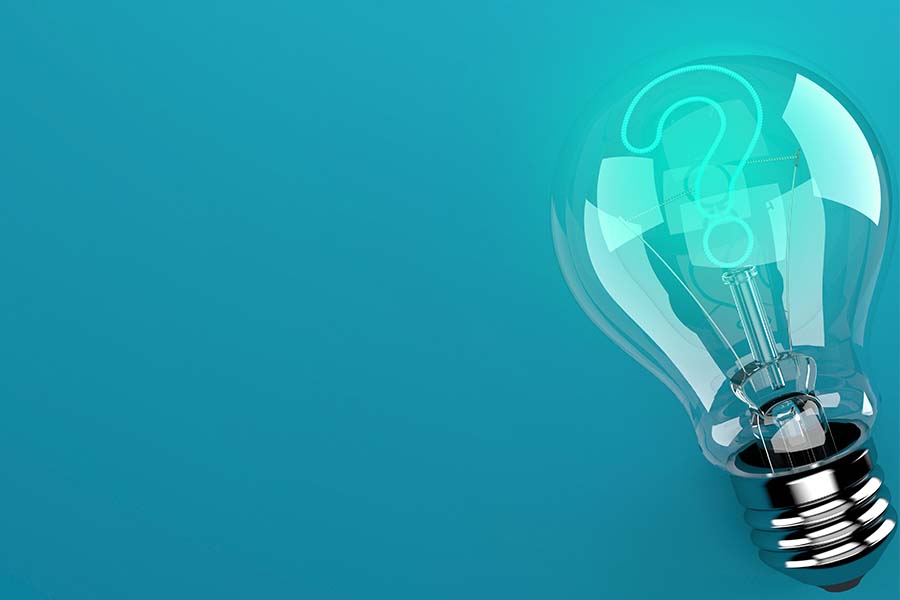 A decorative image depicting a lightbulb with a question mark illuminated inside the bulb.