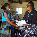 teacher receiving a certificate
