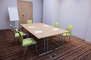 Table, chairs, flipchart