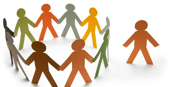 The picture shows a cut out of human forms joining hands to form a circle. One person is excluded from the circle