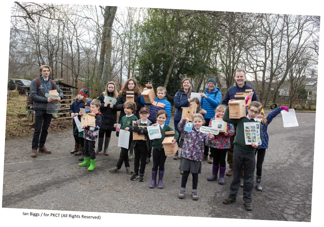 Primary school children with bird boxes by GreenTweed Eco and educational materials by PKCT.