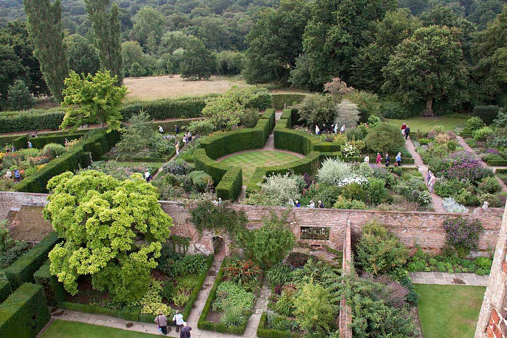 An aerial view of the castle gardens which are divided into 'rooms' and accessed through doorways in hedging or walling.