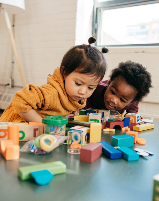 This is a photograph of two children playing.
