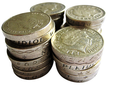 Four stacks of pound coins