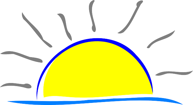 A cartoon drawing of the sun setting over the ocean