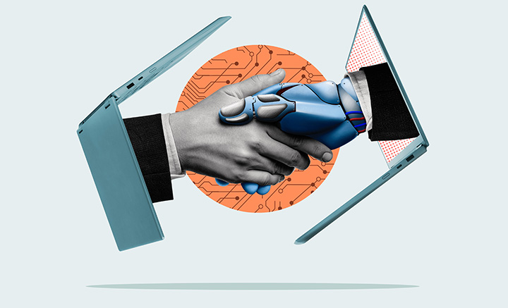 Hands that are coming out of laptop computers are shaking hands.