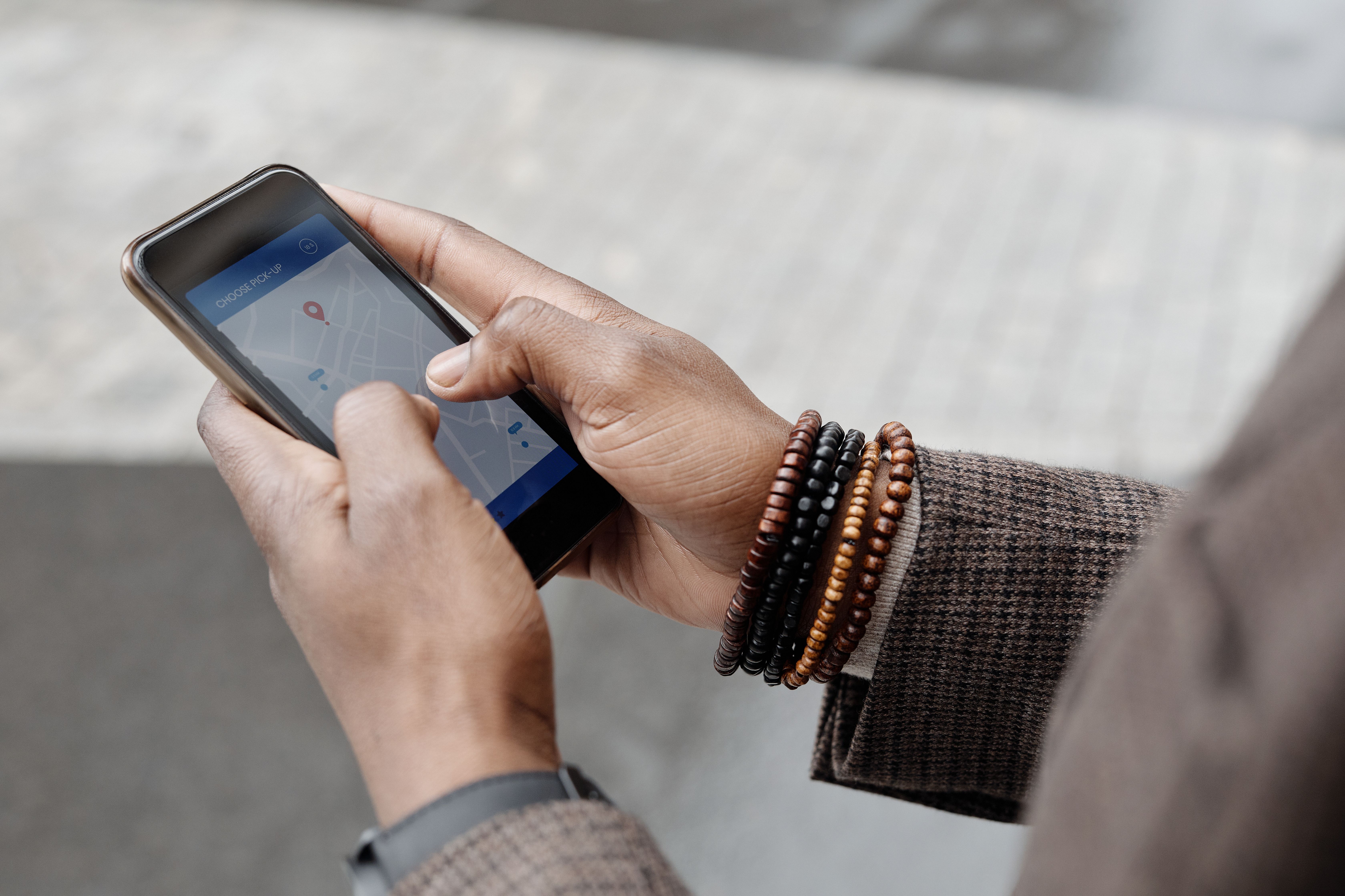 Someone using location mapping on a mobile phone