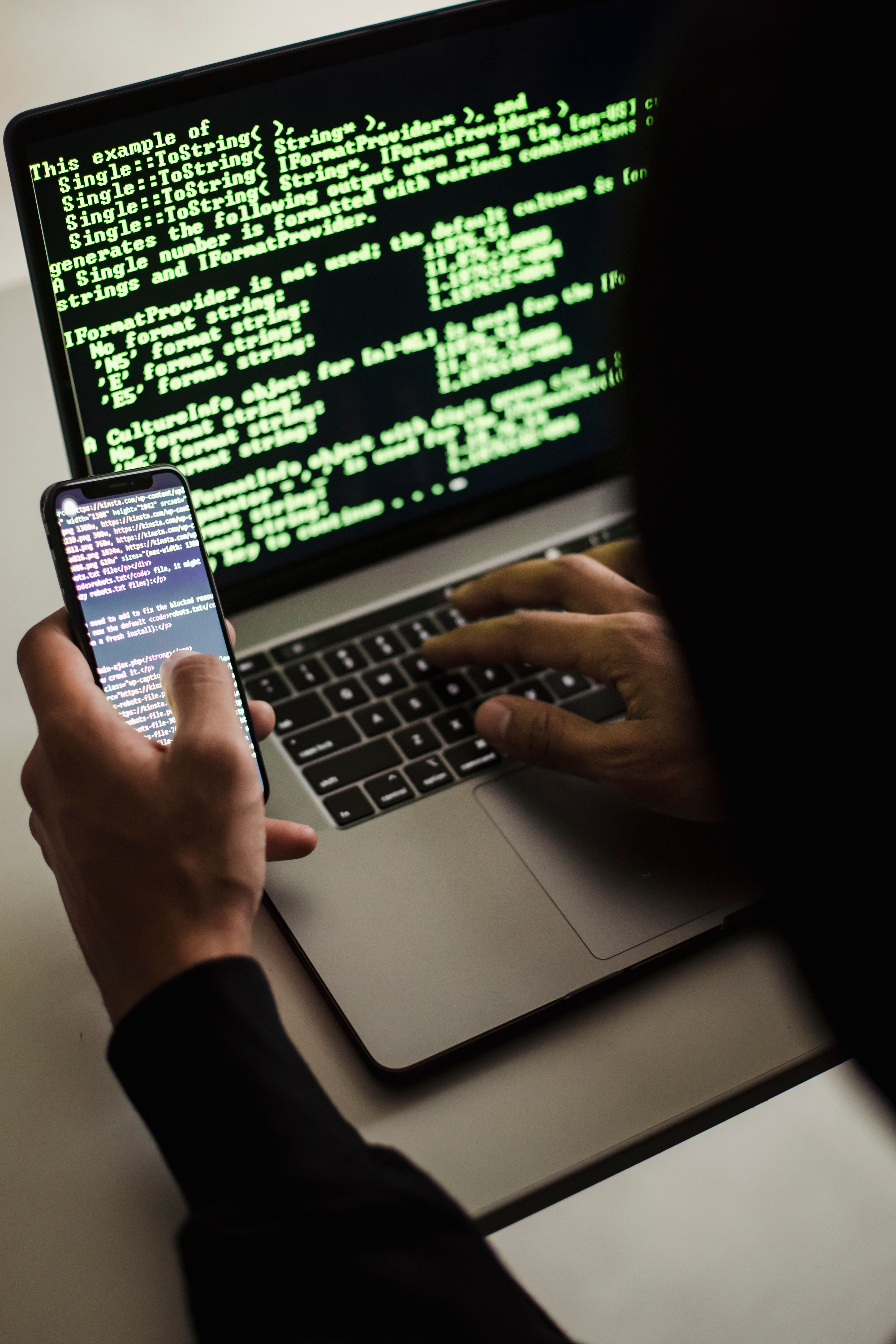 Computer data on screen and mobile phone